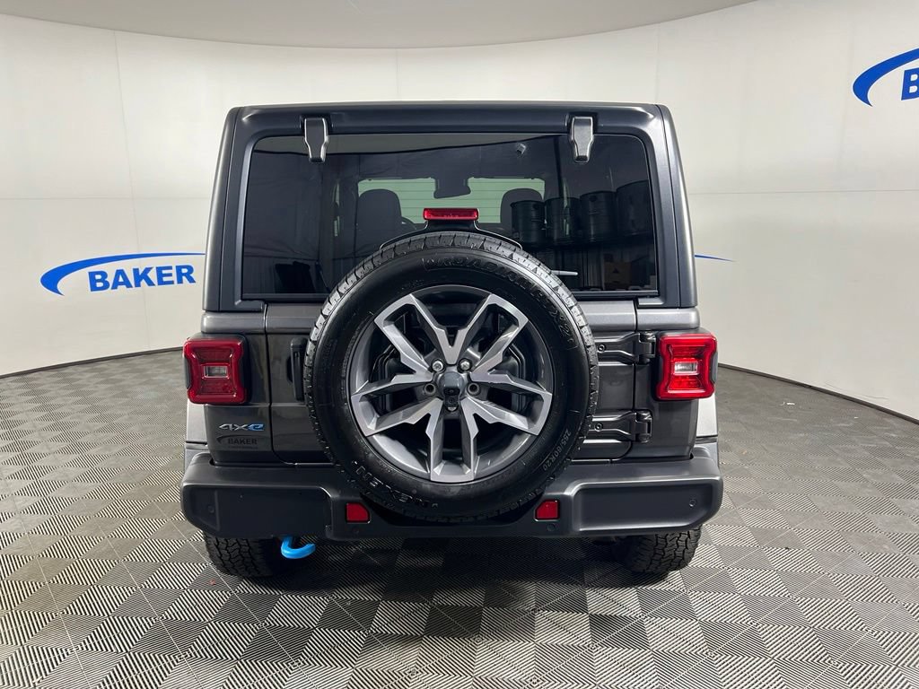Used 2024 Granite Crystal Metallic Clearcoat Jeep Sport image 5