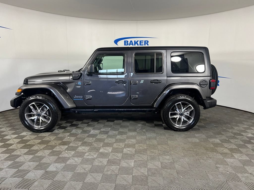 Used 2024 Granite Crystal Metallic Clearcoat Jeep Sport image 2