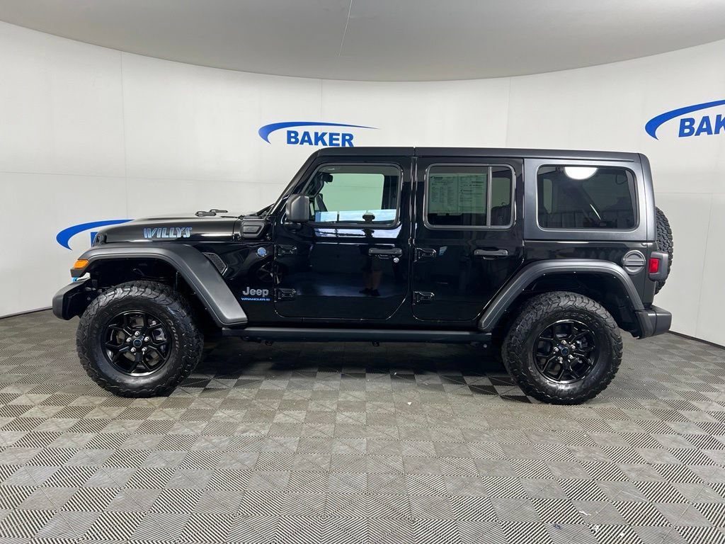 Used 2024 Black Clearcoat Jeep Sport image 2