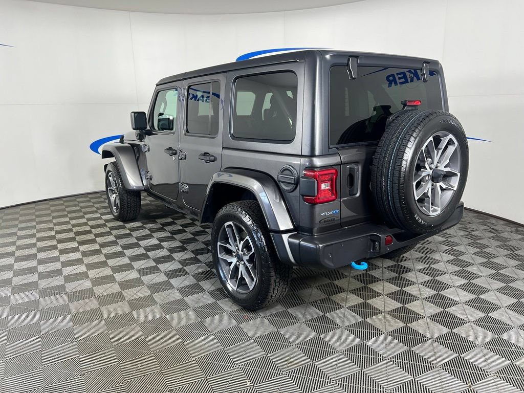 Used 2024 Granite Crystal Metallic Clearcoat Jeep Sport image 3