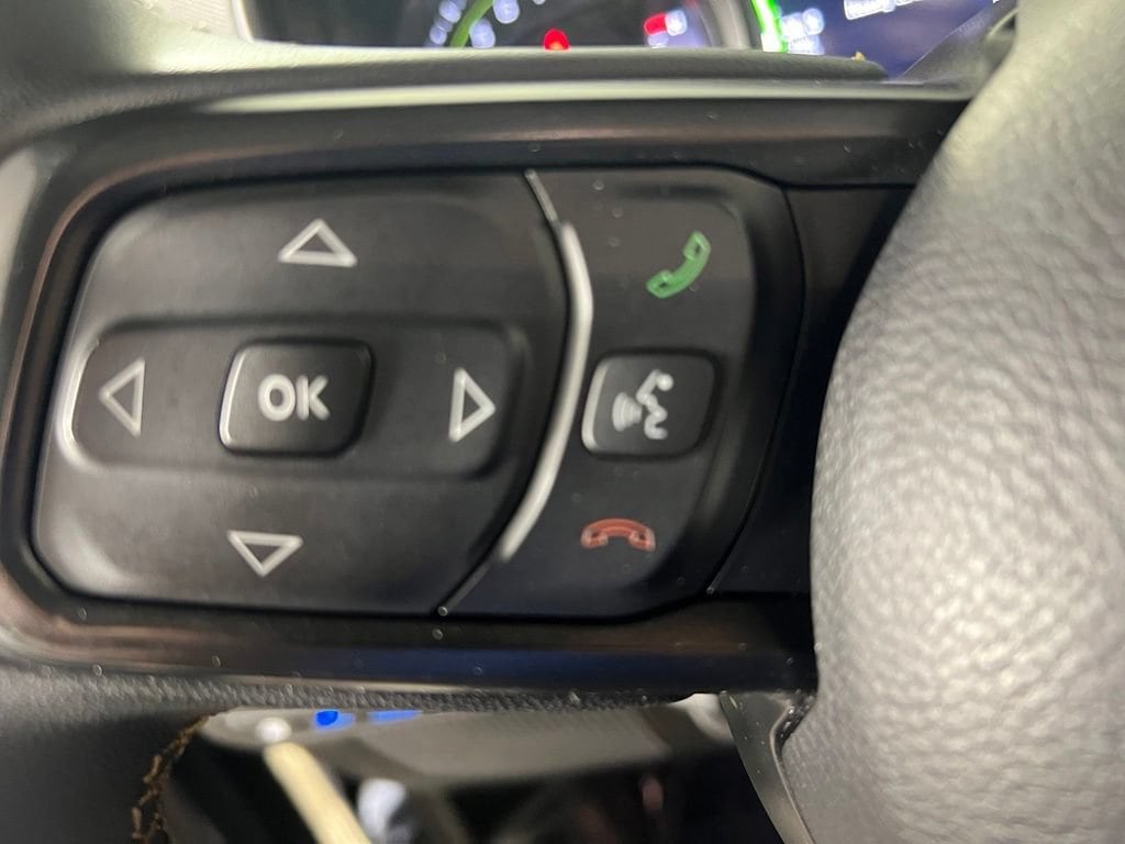 Used 2024 Granite Crystal Metallic Clearcoat Jeep Sport image 21