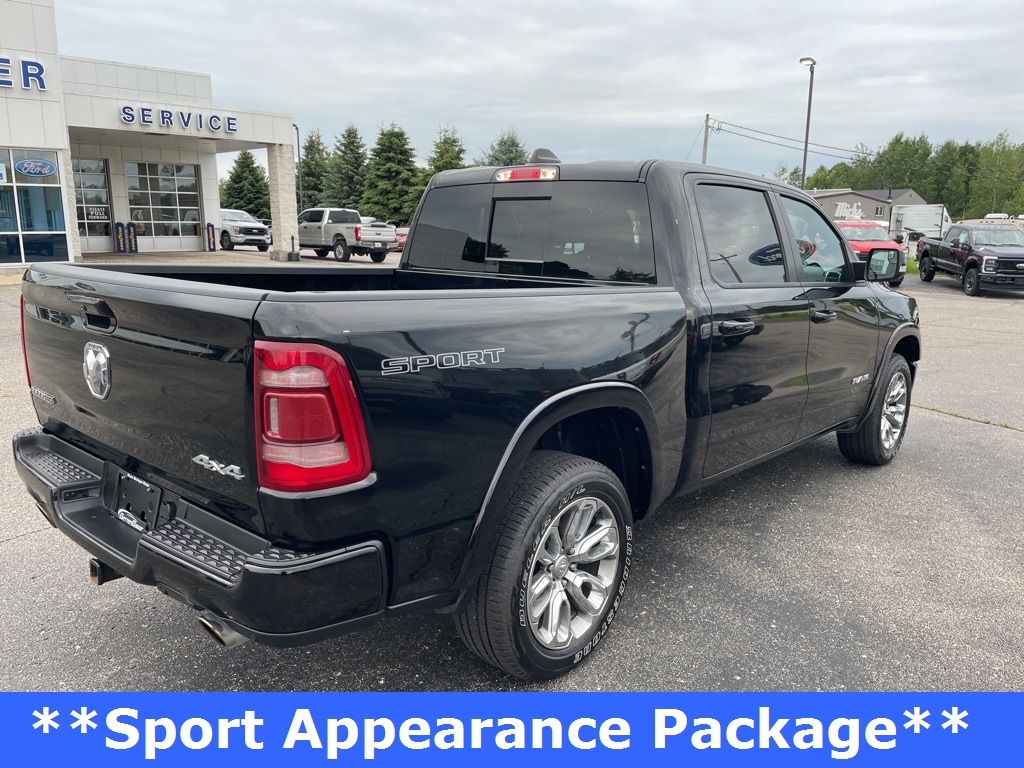 Used 2021 RAM Ram 1500 Pickup Laramie with VIN 1C6SRFJT7MN615557 for sale in Ludington, MI