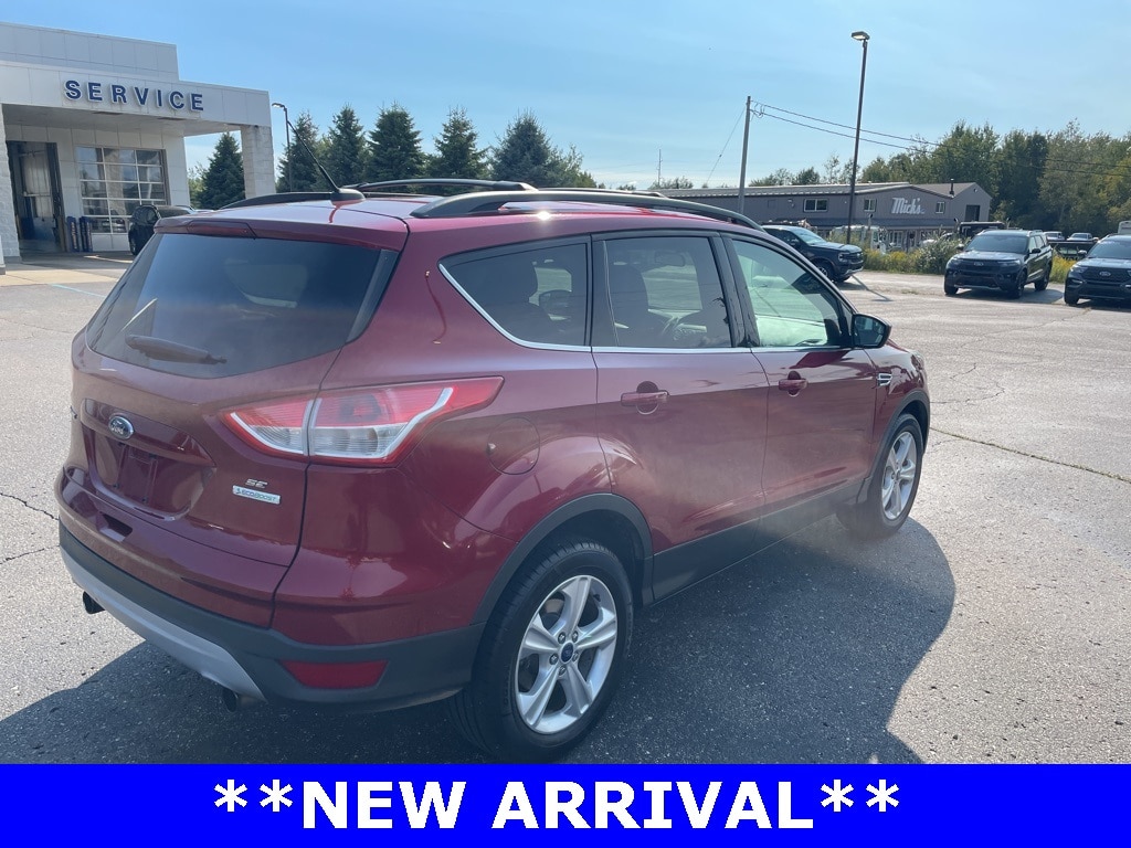 Used 2013 Ford Escape SE with VIN 1FMCU0GX9DUD16673 for sale in Ludington, MI