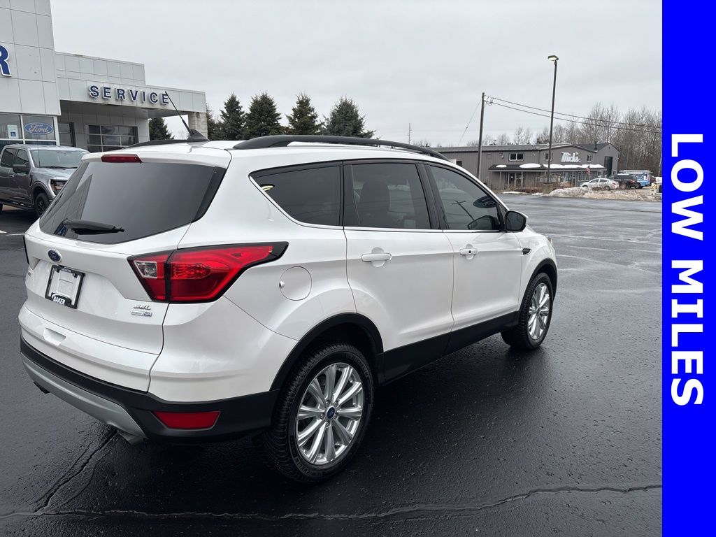 Used 2019 Ford Escape SEL with VIN 1FMCU9H97KUB40921 for sale in Ludington, MI