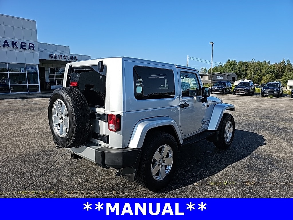 Used 2010 Jeep Wrangler Sahara with VIN 1J4AA5D15AL192737 for sale in Ludington, MI