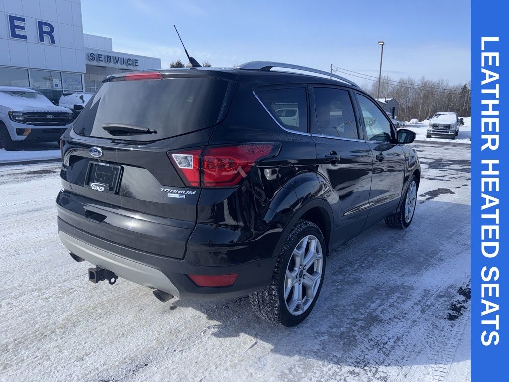 Used 2019 Ford Escape Titanium with VIN 1FMCU9J99KUB56323 for sale in Ludington, MI