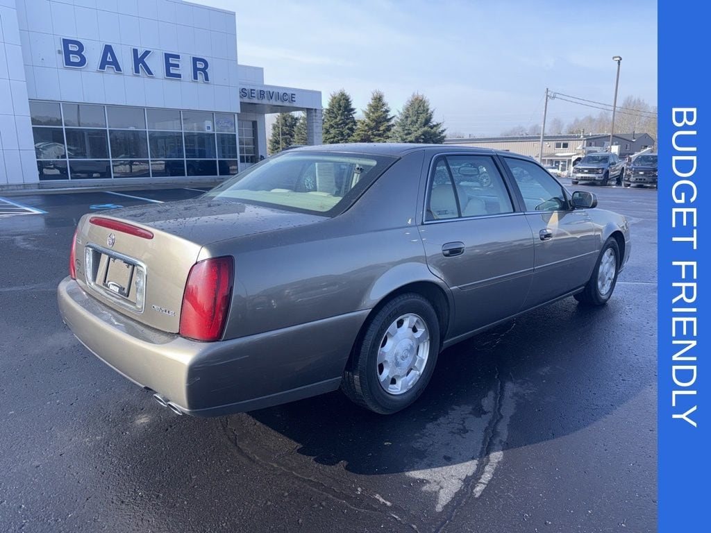 Used 2002 Cadillac DeVille Base with VIN 1G6KD54Y12U243440 for sale in Ludington, MI