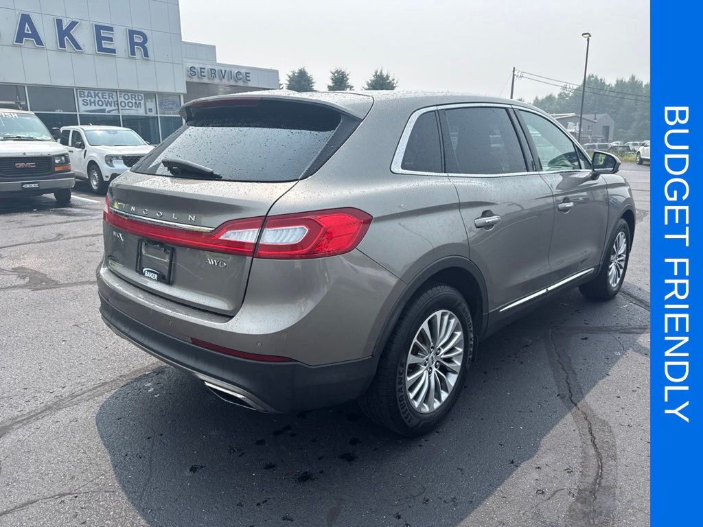 Used 2016 Lincoln MKX Select with VIN 2LMTJ8KRXGBL29009 for sale in Ludington, MI
