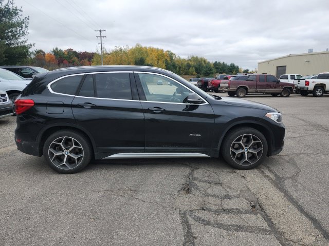 Used 2018 BMW X1 28i with VIN WBXHT3C38J5K24870 for sale in Cadillac, MI