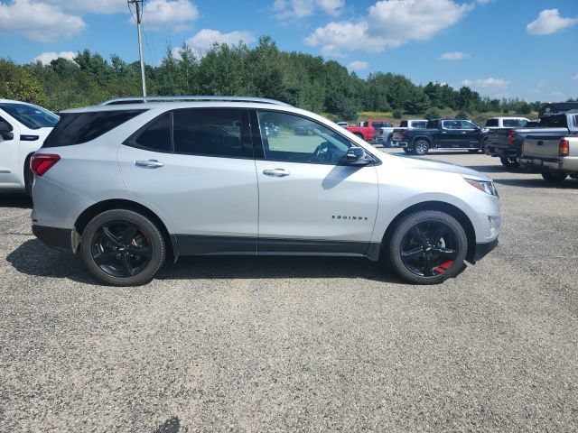 Used 2021 Chevrolet Equinox Premier with VIN 2GNAXXEVXM6153289 for sale in Cadillac, MI