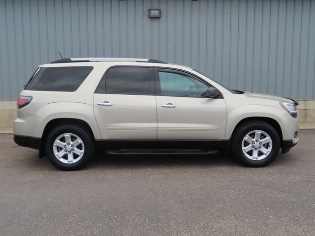 Used 2016 GMC Acadia SLE-2 with VIN 1GKKVPKD0GJ277016 for sale in Cadillac, MI