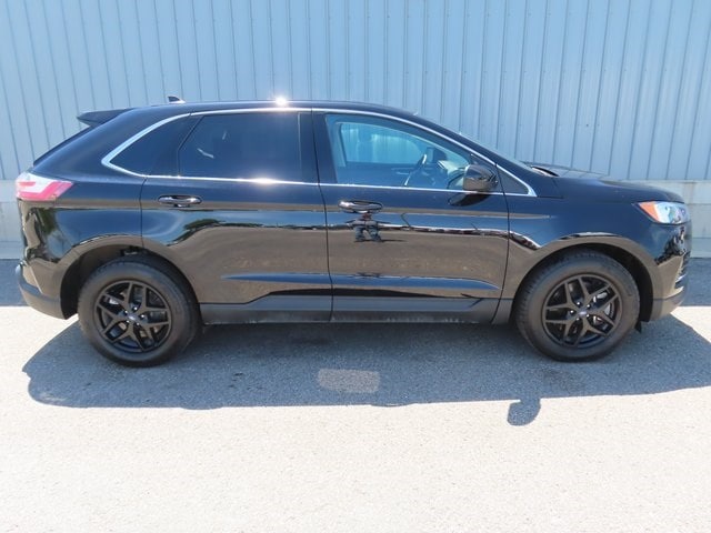 Used 2022 Ford Edge SEL with VIN 2FMPK4J90NBA65963 for sale in Cadillac, MI