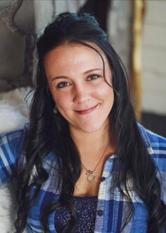 Staff member Cassandra Sanderson from d32abe03cb2f