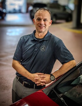 Staff member Christopher Roth from f5c9b3ca0d4c