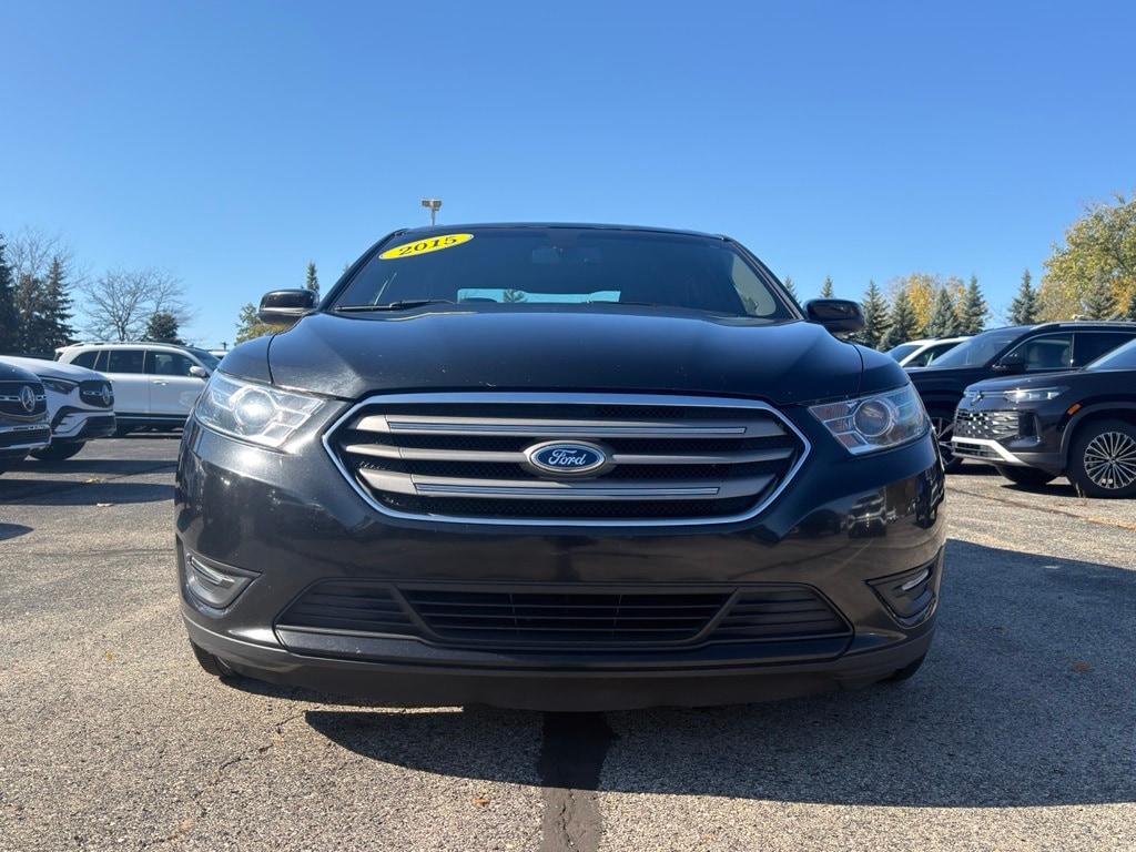 Used 2015 Ford Taurus SEL with VIN 1FAHP2E94FG136039 for sale in Grand Rapids, MI