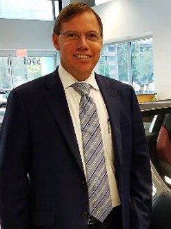 Staff member Greg Betten from ID_e0a89f5e8d0c