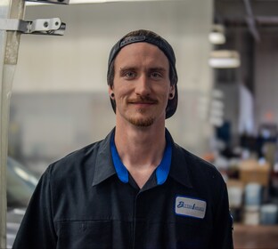 Staff member Bradley Curtis from ID_69a6ddb14412