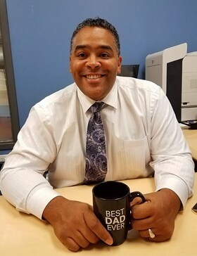 Staff member Dominic Jackson from ID_69a6ddb14412