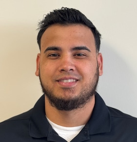 Staff member Jose B. from ID_2d53487d3a6b