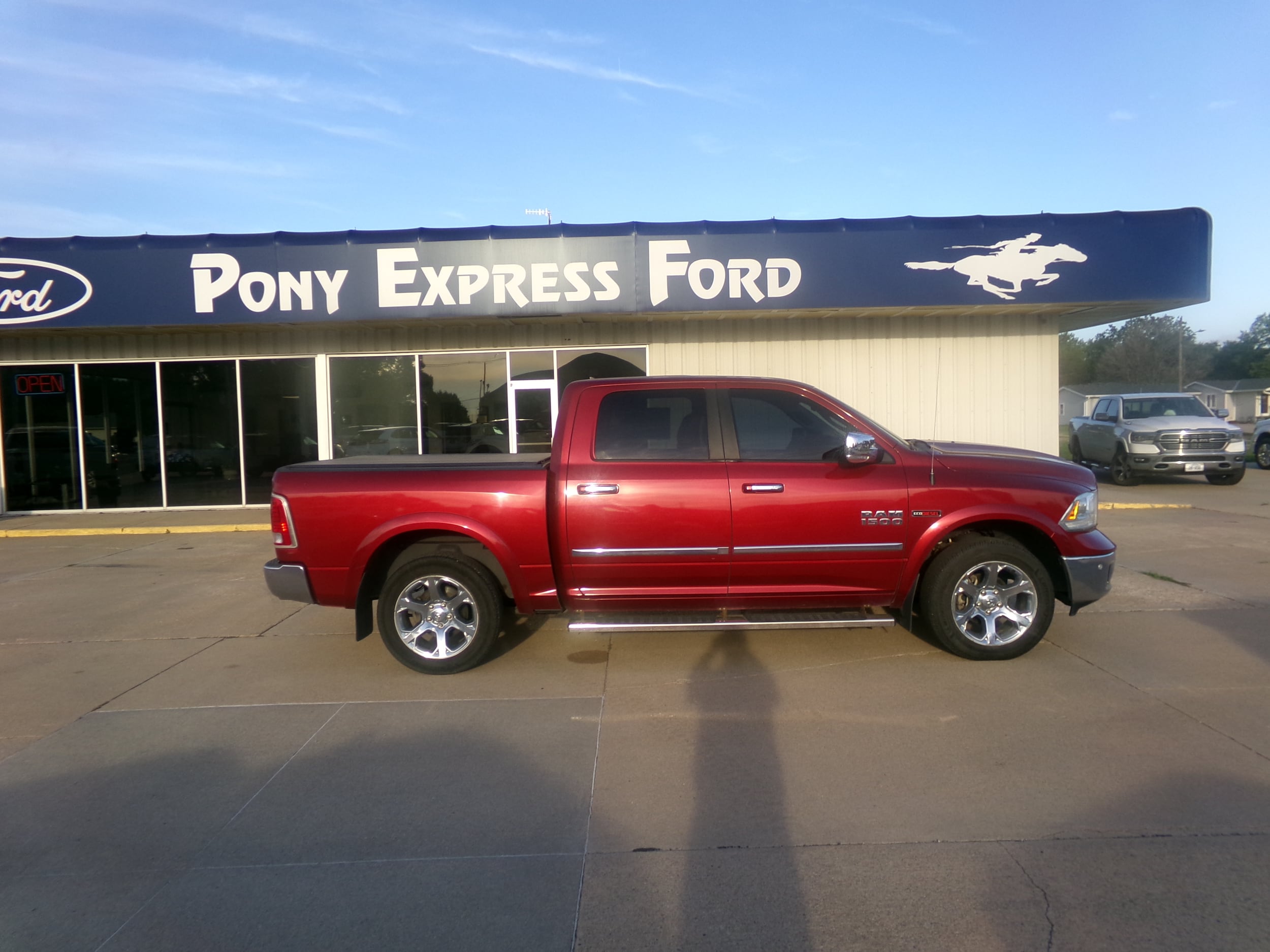 Used 2014 RAM Ram 1500 Pickup Laramie with VIN 1C6RR7NM4ES409610 for sale in Minden, NE