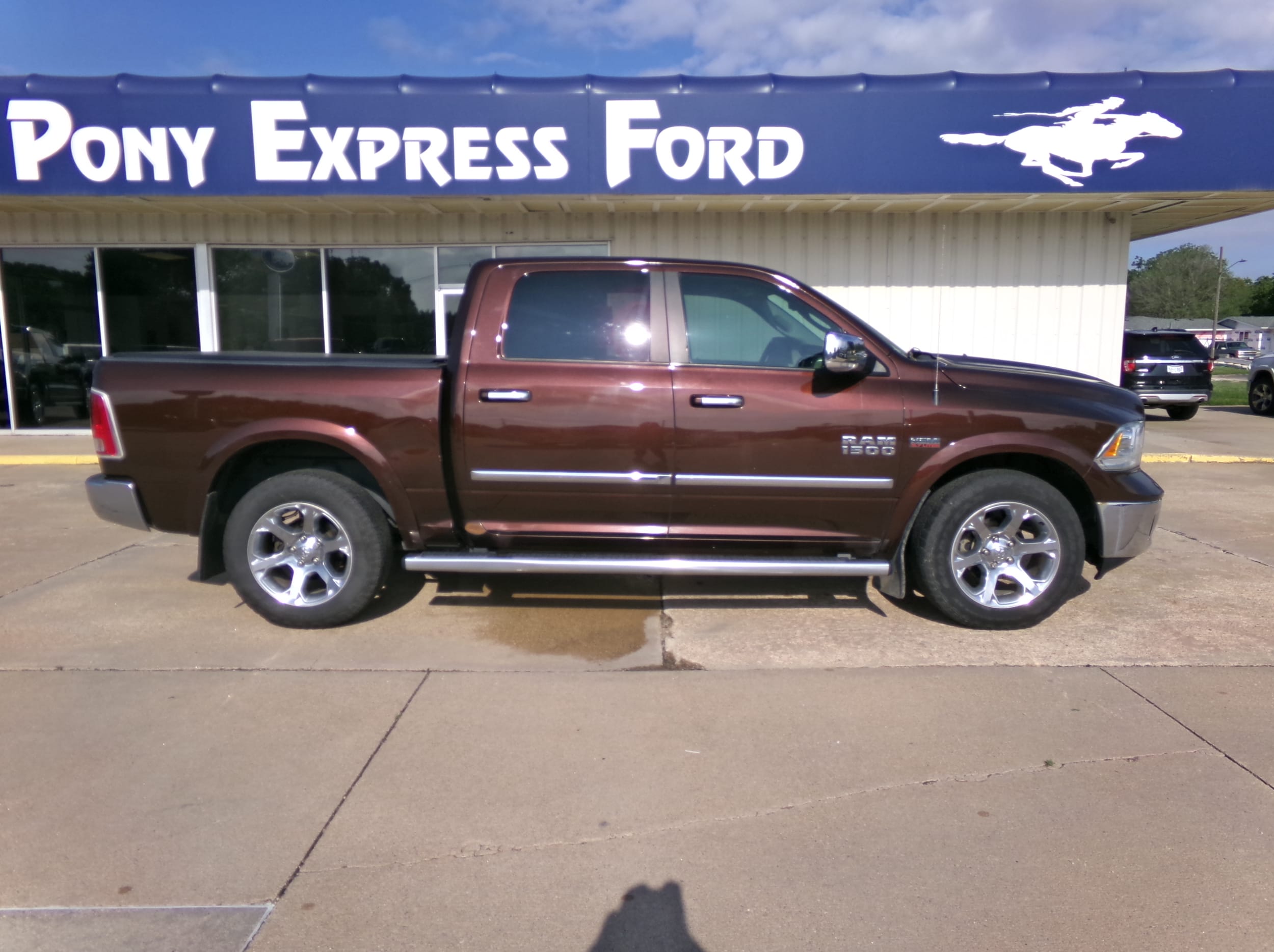 Used 2015 RAM Ram 1500 Pickup Laramie with VIN 1C6RR7NT6FS725924 for sale in Minden, NE