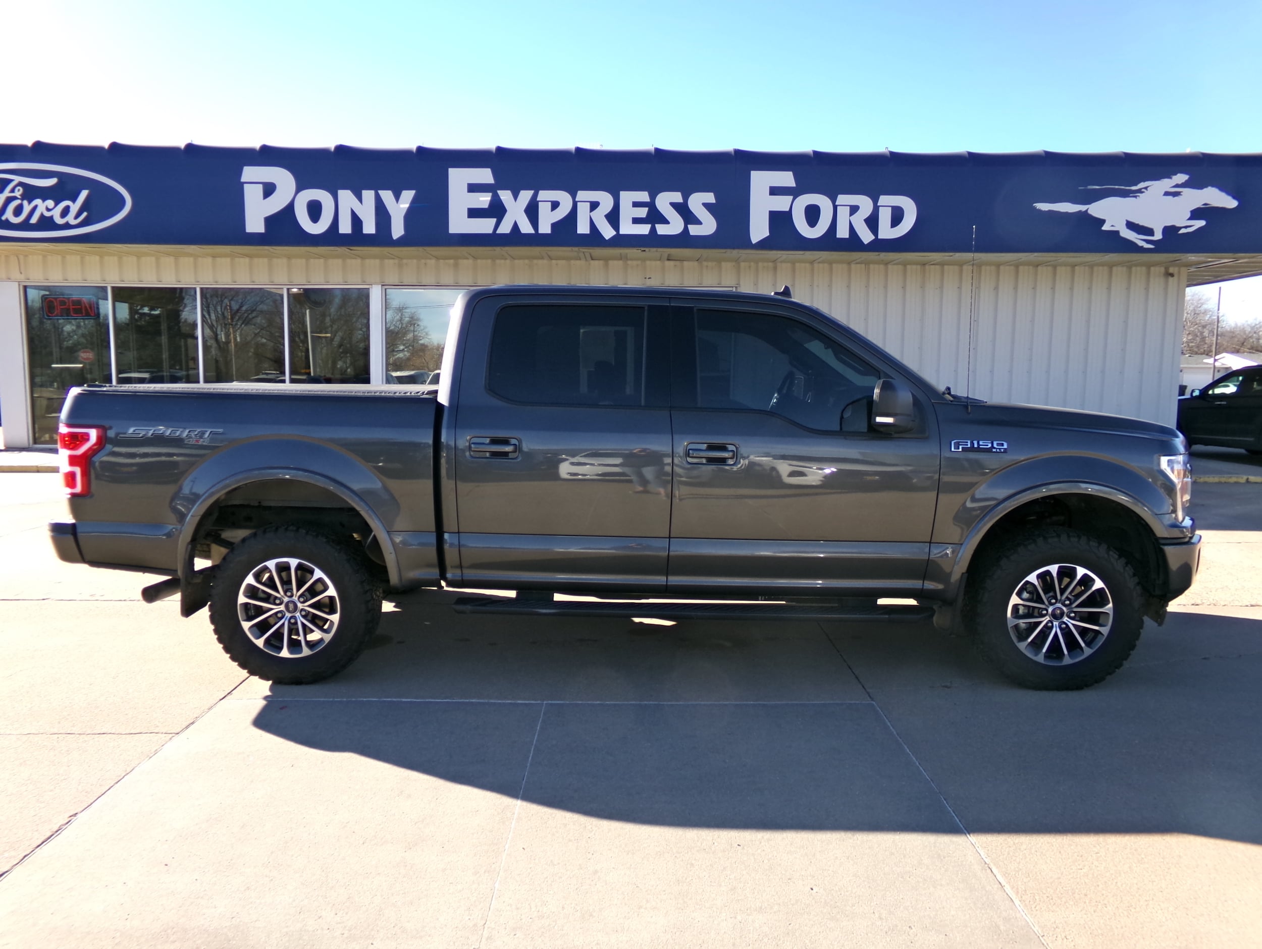 Used 2019 Ford F-150 XLT with VIN 1FTEW1E48KKE62884 for sale in Minden, NE