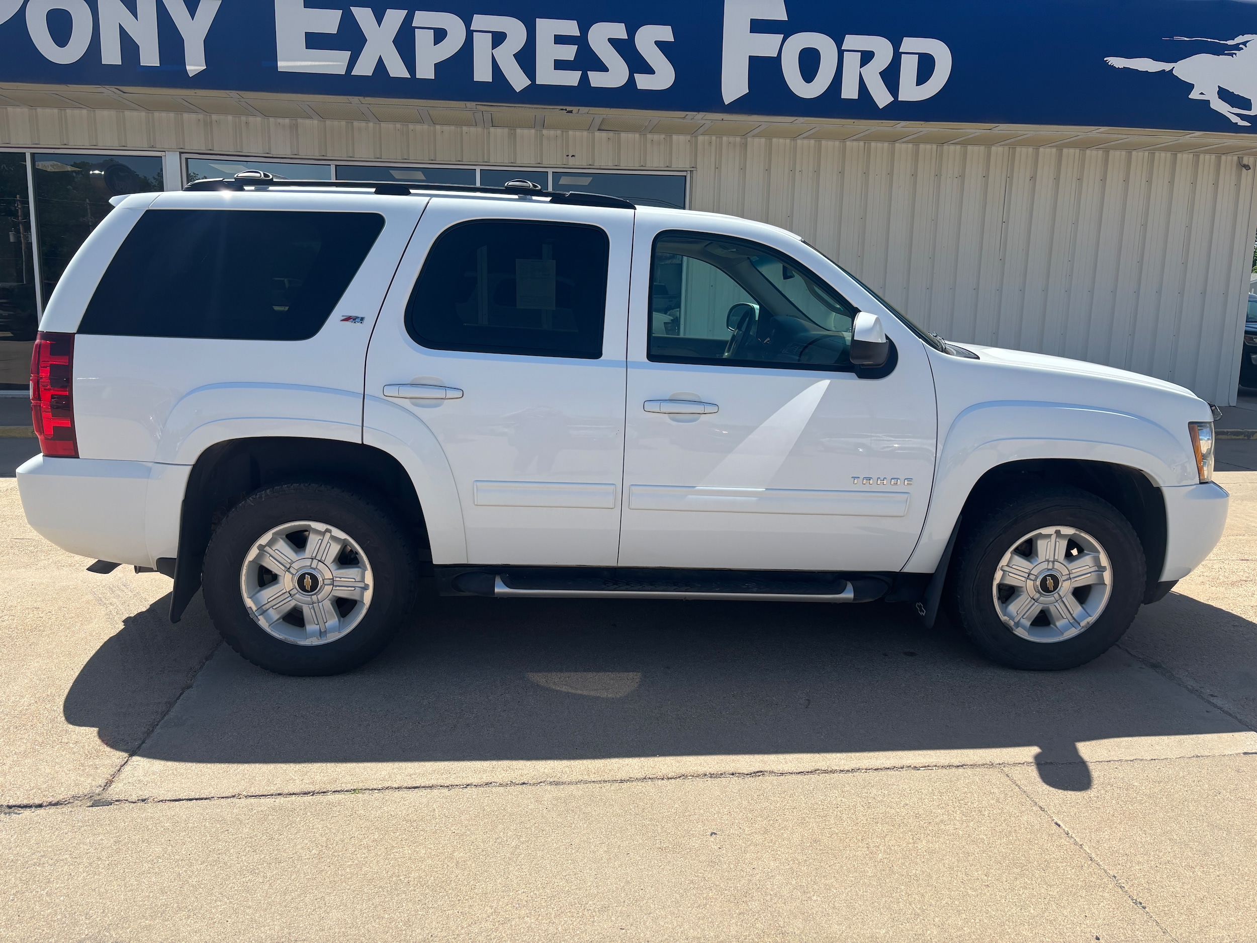 Used 2013 Chevrolet Tahoe LT with VIN 1GNSKBE05DR256103 for sale in Minden, NE