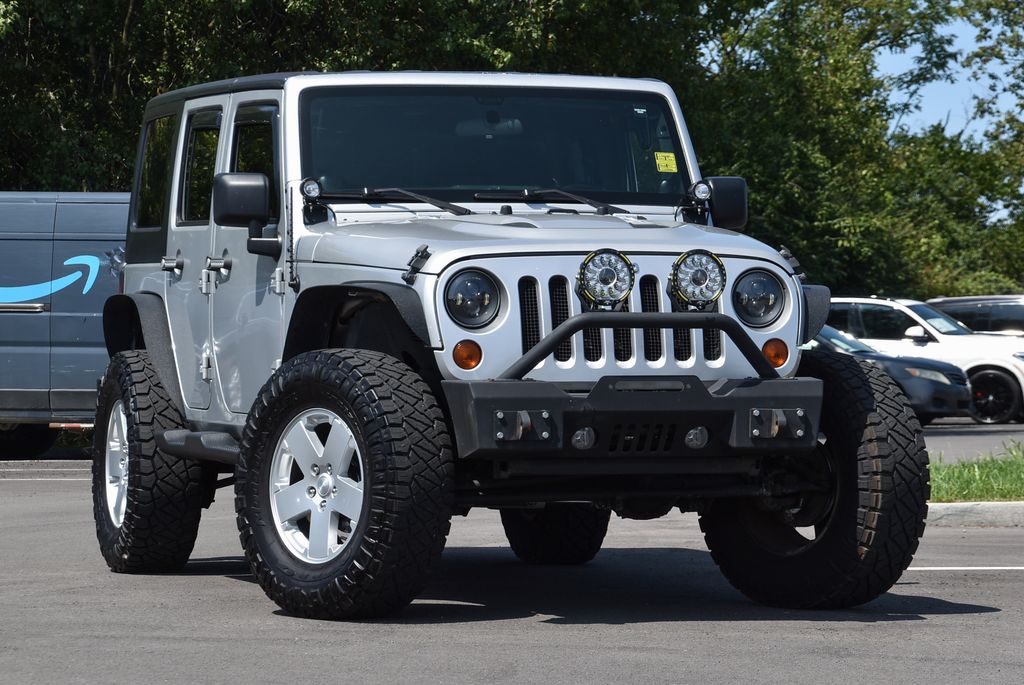 Used 2012 Jeep Wrangler Unlimited Sahara with VIN 1C4BJWEG9CL114080 for sale in Nicholasville, KY