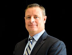 Staff member Brett Henkel from c52757bb9982