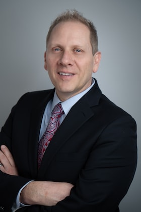 Staff member Brett Maxwell from ID_e2d9c0