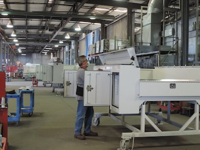 Scelzi employee working on a custom service body.