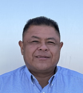 Staff member Robert Enriquez from 9c962a870d0e