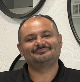 Staff member Eddie Mendivil from 82c368819713