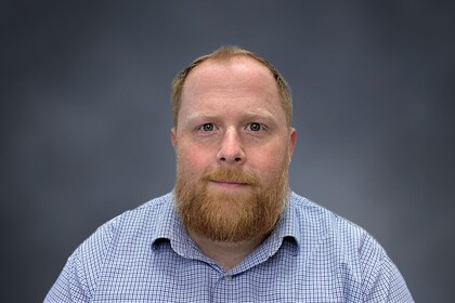 Staff member Jeffrey Walsh from ID_3e96fb986c47