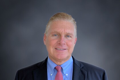 Staff member John Lynch from ID_9f1041212fea
