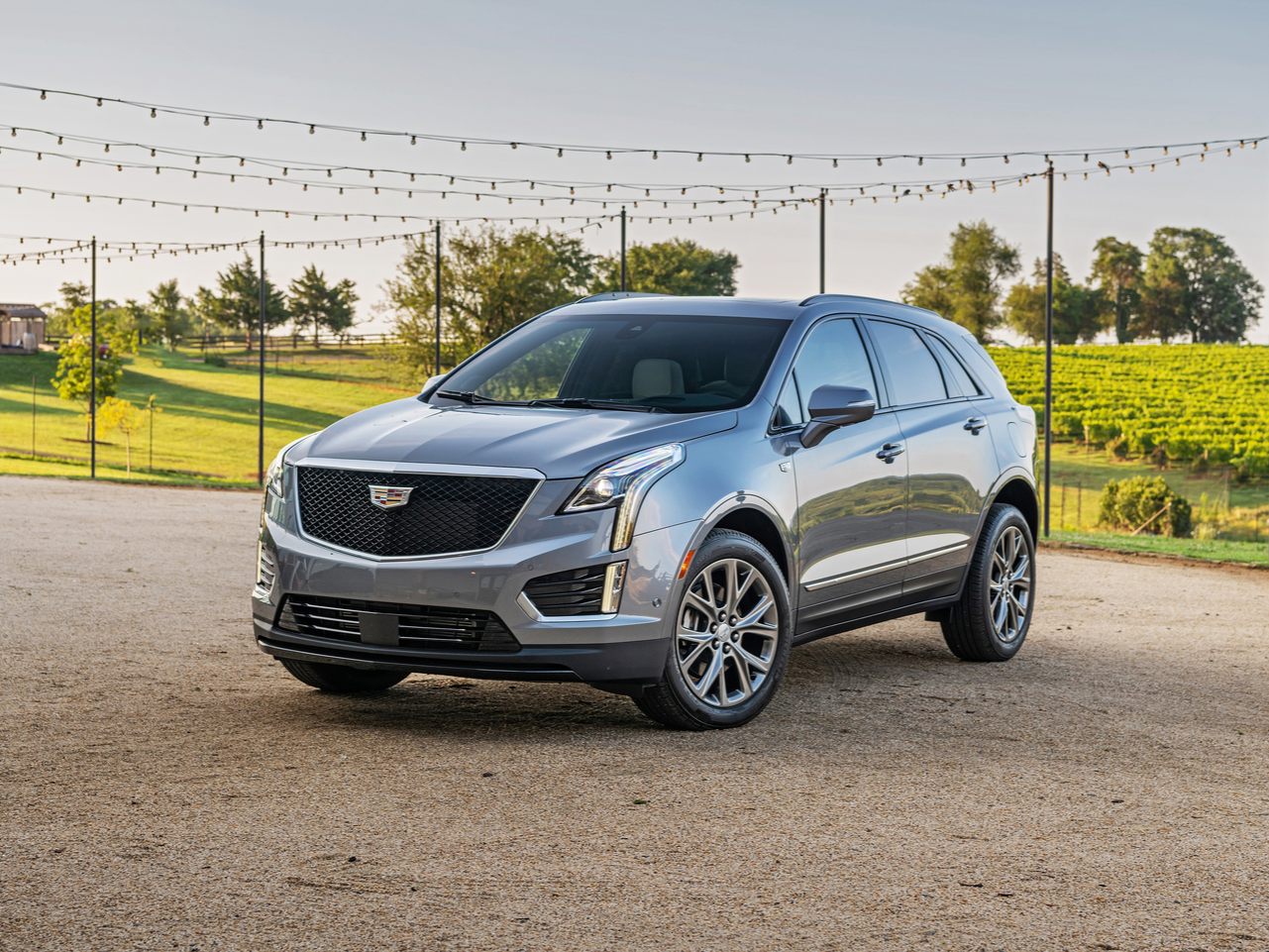 A grey 2021 Cadillac XT5 at the ourdoors