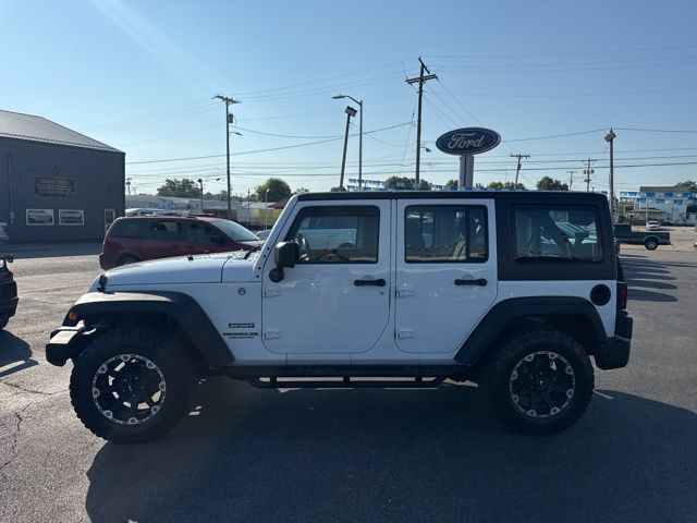 Used 2013 Jeep Wrangler Unlimited Sport with VIN 1C4BJWDG6DL694231 for sale in Washington, IN