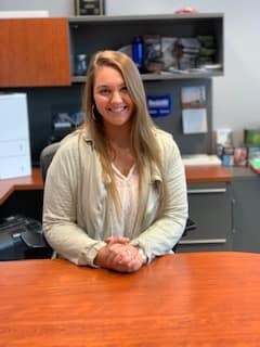 Staff member Caroline Woodruff from ID_69c6b7f8ad73