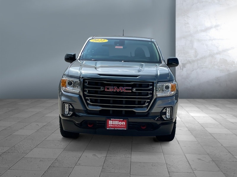 Used 2022 GMC Canyon AT4 with VIN 1GTG6FEN4N1112077 for sale in Iowa City, IA