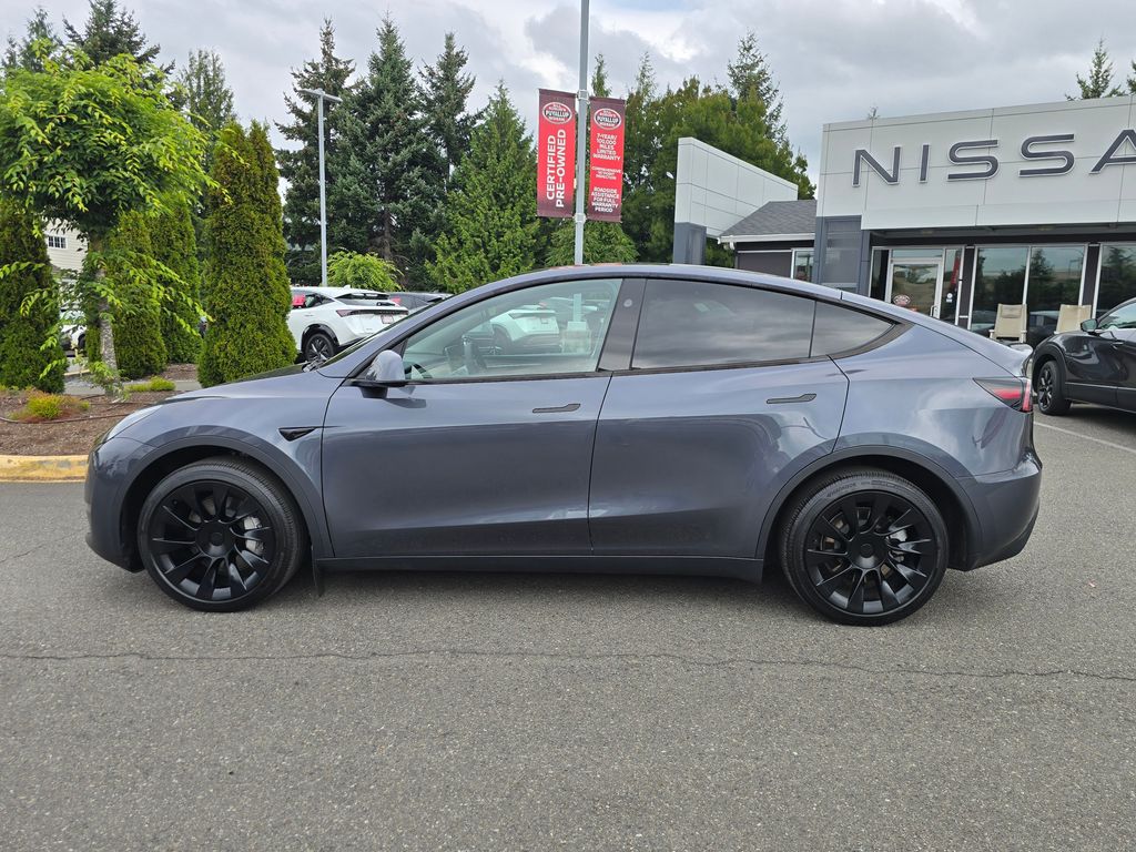 Used 2023 Tesla Model Y Long Range with VIN 7SAYGDEE7PF899108 for sale in Puyallup, WA
