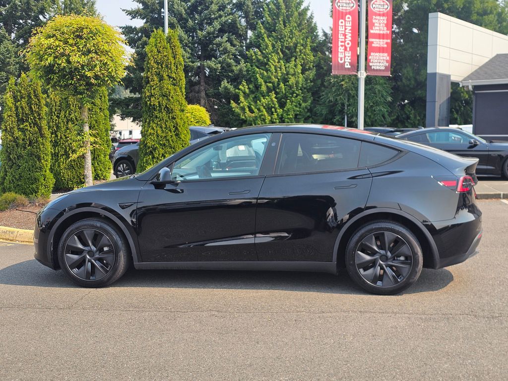 Used 2025 Tesla Model Y Long Range with VIN 7SAYGDEEXSF290720 for sale in Puyallup, WA
