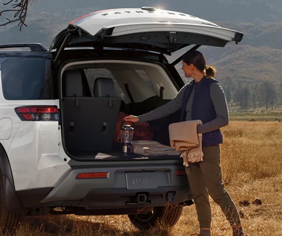 Nissan Pathfinder with the rear cargo area open and gear loaded, a three-row SUV for Kent families