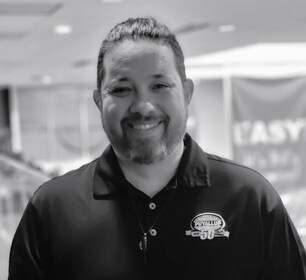 Staff member Adam Aguillon from ID_798476