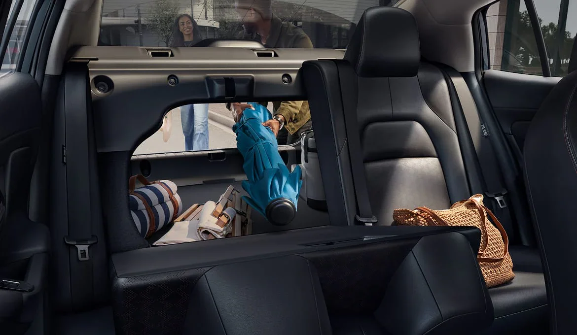 Nissan Sentra rear seat with the 60/40 split folded, showing the pass-through to the trunk