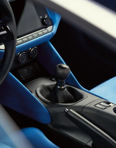 Nissan Z manual shifter design in the cockpit, current-generation model shown