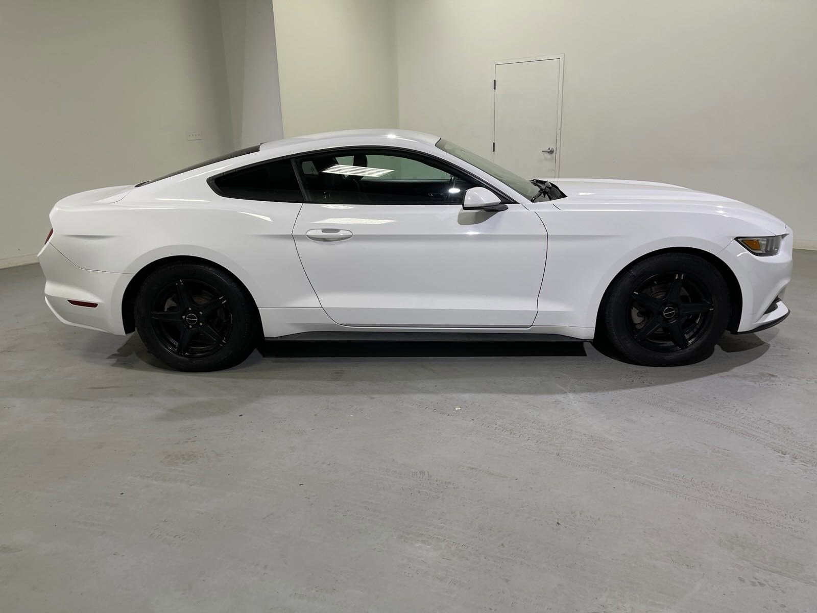 Used 2017 Ford Mustang V6 with VIN 1FA6P8AM4H5301784 for sale in Kalkaska, MI