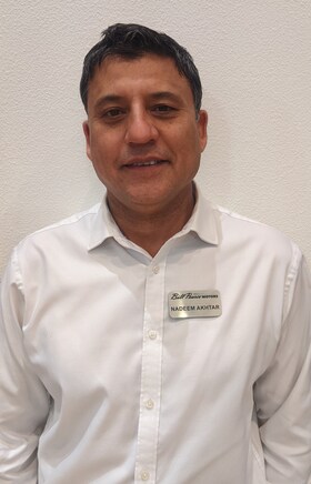 Staff member Nadeem Akhtar from a4bf2a54ed28
