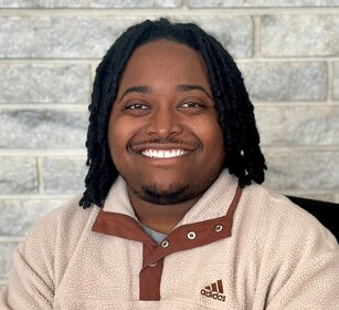 Staff member Tahje H from ID_14a6c1208f11