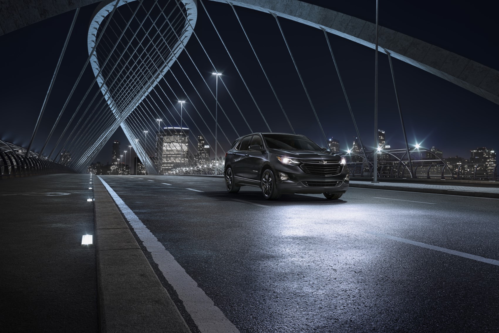 Certified Pre-Owned Chevy Equinox on a Bridge at Night