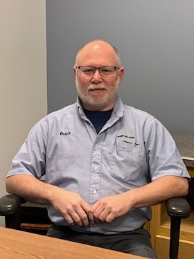 Staff member LEON (BUCK) BELILE from ID_c10249666b02